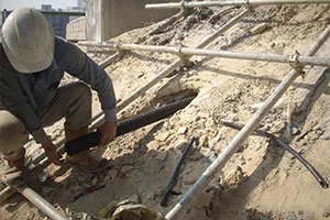 Slope improvement by insatllation of soil nails and raking drains